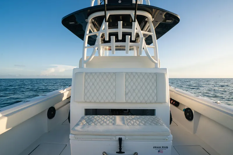  Yacht Photos Pics 2023 Front Runner 36 Center Console boat on open water, featuring cushioned seating.