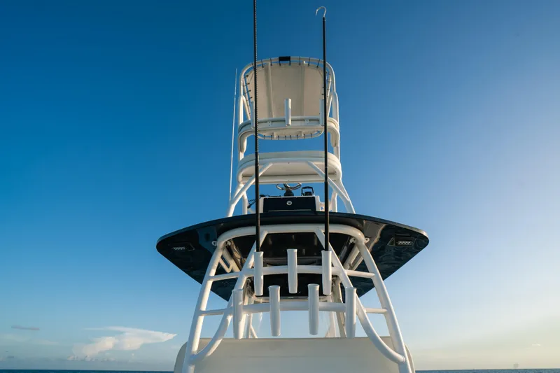  Yacht Photos Pics 2023 Front Runner 36 Center Console boat tower against clear blue sky.