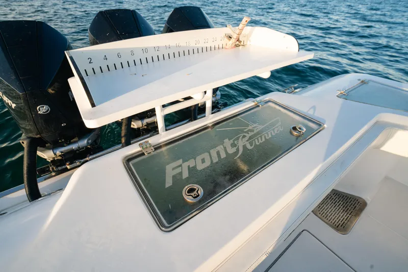  Yacht Photos Pics 2023 Front Runner 36 Center Console boat with measuring board and triple engines.