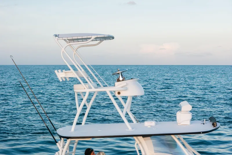  Yacht Photos Pics 2023 Front Runner 36 Center Console boat on open sea, featuring elevated helm station.