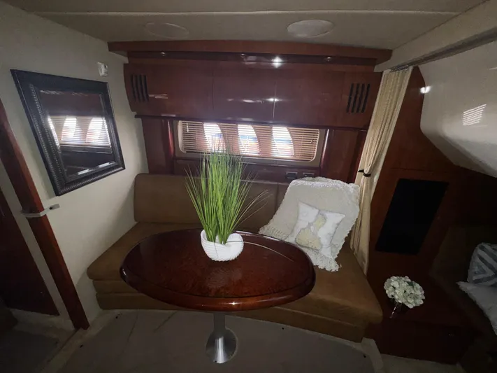  Yacht Photos Pics Interior of 2006 Sea Ray 380 Sundancer with cozy seating and elegant decor.