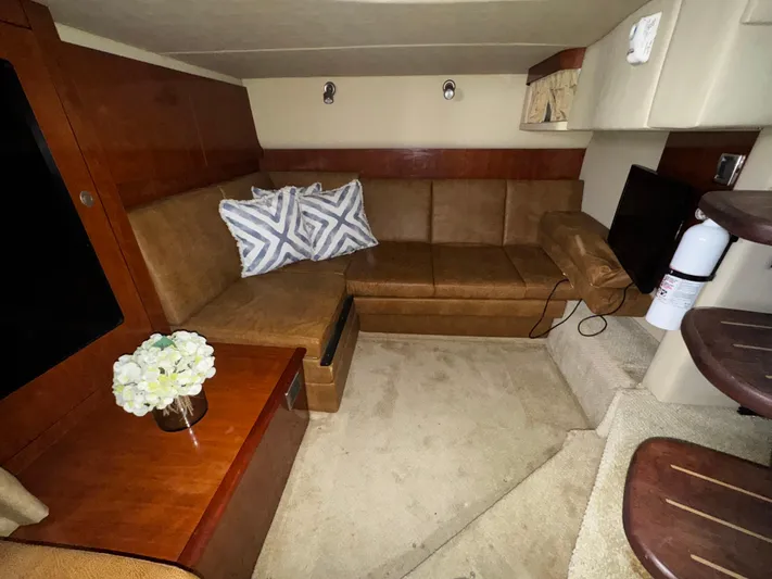  Yacht Photos Pics Interior of 2006 Sea Ray 380 Sundancer with cozy seating and elegant decor.
