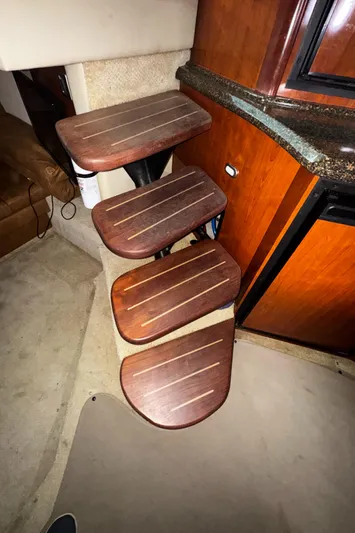  Yacht Photos Pics Wooden steps inside a 2006 Sea Ray 380 Sundancer yacht, leading to the cabin.