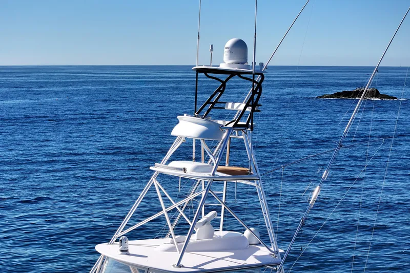 Trouble Maker Yacht Photos Pics Viking 46 Convertible 2013 yacht tower against a clear blue ocean backdrop.