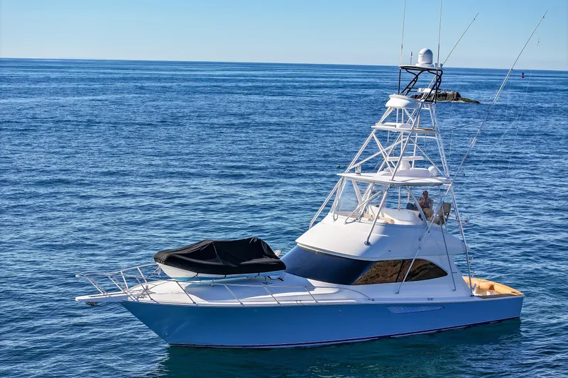 Trouble Maker Yacht Photos Pics 2013 Viking 46 Convertible yacht on calm ocean waters.