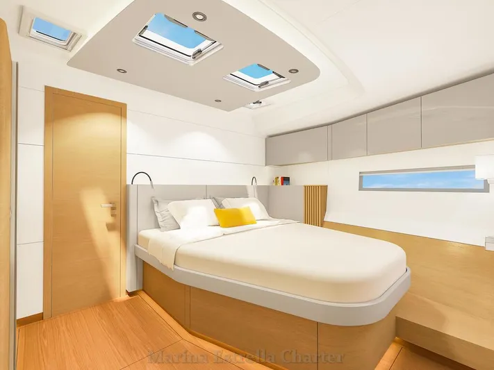  Yacht Photos Pics Luxurious interior of 2025 Hanse 590 yacht cabin with modern design and skylights.