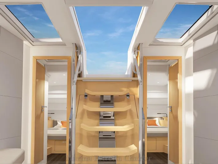  Yacht Photos Pics Luxurious interior of 2025 Hanse 590 yacht with skylights and modern design.