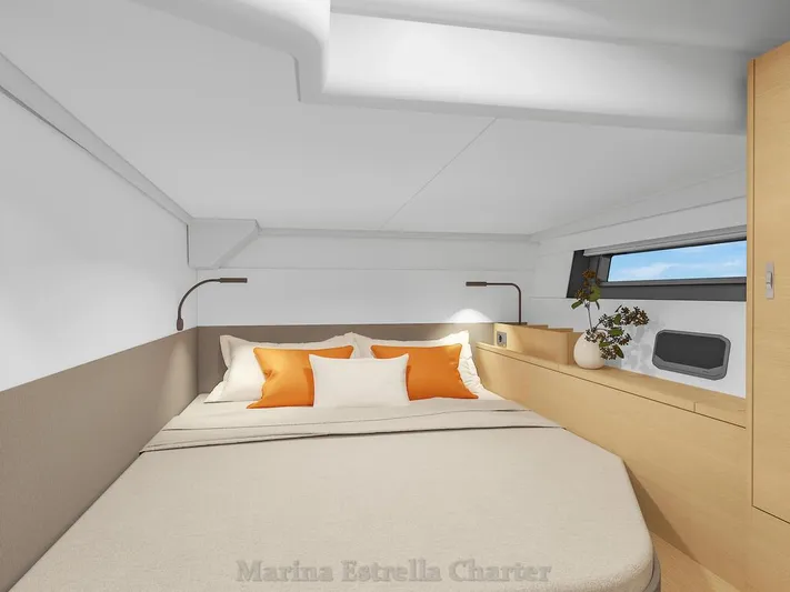  Yacht Photos Pics Luxurious cabin interior of 2025 Hanse 590 yacht with modern design and cozy bedding.