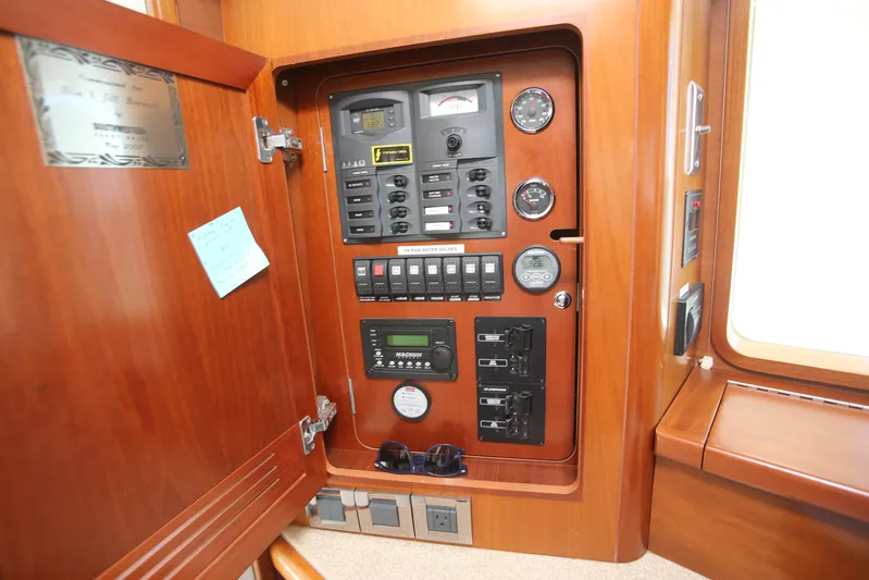 Gracie May Yacht Photos Pics Electrical panel inside 2007 Beneteau Swift Trawler 42, featuring various controls and gauges.