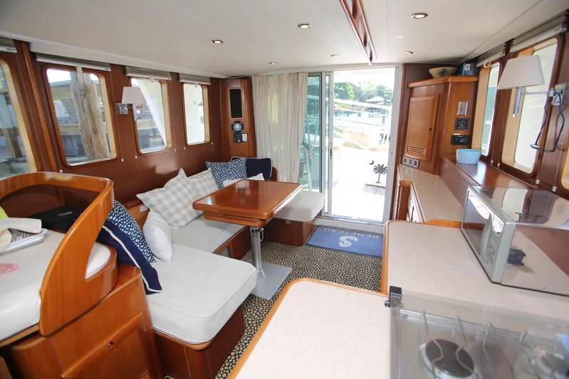 Gracie May Yacht Photos Pics Interior of 2007 Beneteau Swift Trawler 42 with cozy seating and modern amenities.