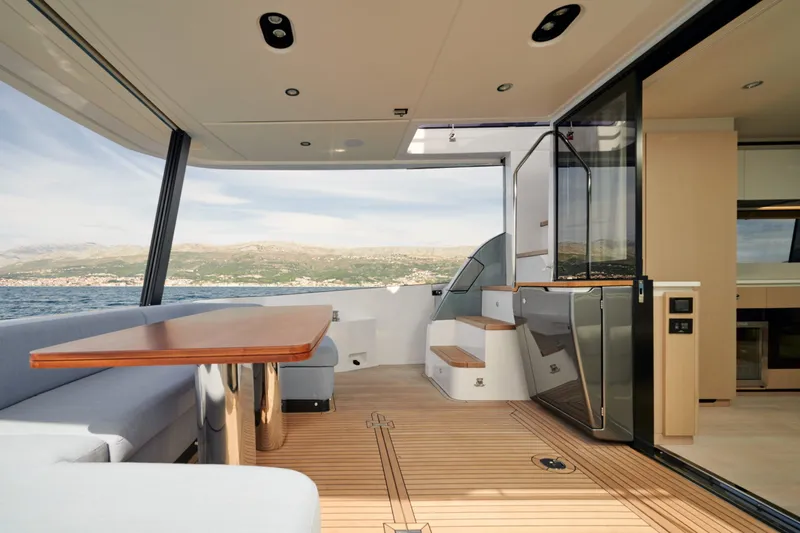  Yacht Photos Pics Luxurious interior of 2022 Azimut 68 Hard Top yacht with scenic ocean view.