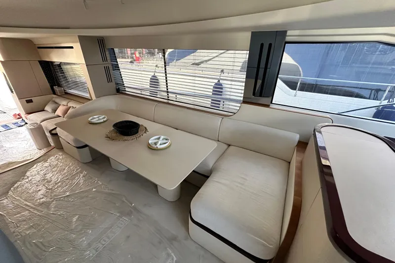  Yacht Photos Pics Luxurious interior of 2022 Azimut 68 yacht with elegant seating and modern decor.