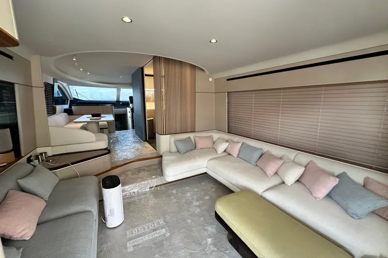  Yacht Photos Pics Luxurious interior of 2022 Azimut 68 yacht with modern seating and elegant design.