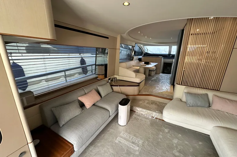  Yacht Photos Pics Luxurious interior of 2022 Azimut 68 yacht with modern furnishings and spacious layout.