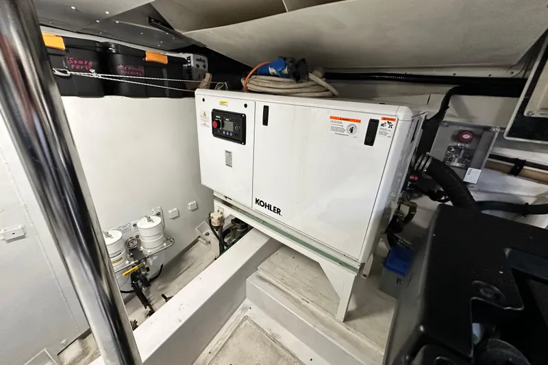  Yacht Photos Pics Engine room of 2022 Azimut 68 yacht with Kohler generator.