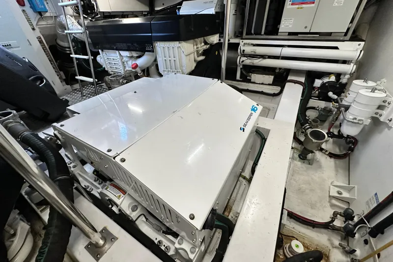  Yacht Photos Pics Engine room of 2022 Azimut 68 yacht featuring Seakeeper 16 stabilizer system.