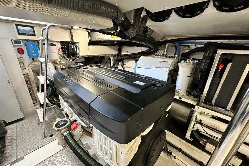  Yacht Photos Pics Engine room of a 2022 Azimut 68 yacht, showcasing advanced machinery and equipment.