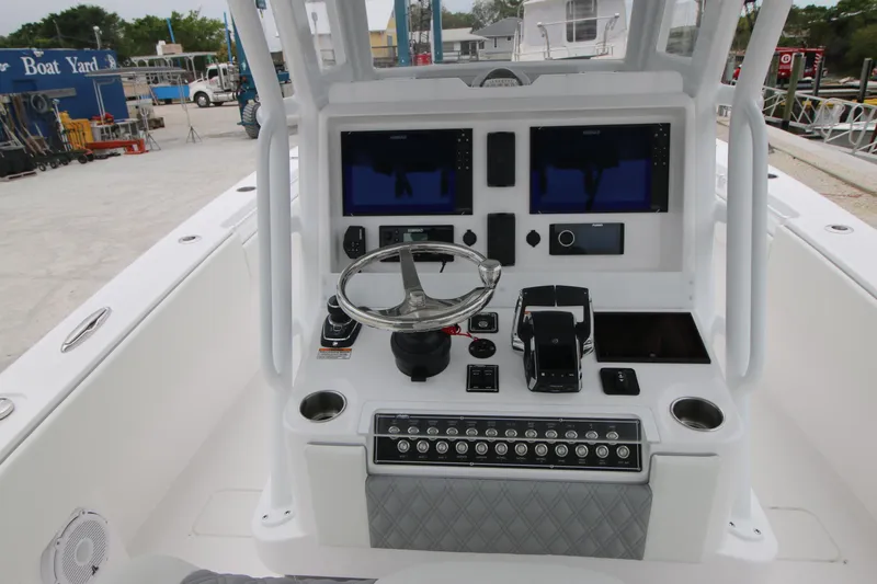  Yacht Photos Pics 2025 Invincible 33 Open Fisherman boat console with advanced navigation and control systems.