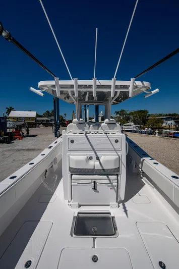  Yacht Photos Pics 2025 Invincible 33 Open Fisherman boat, sleek design, spacious deck, modern features.