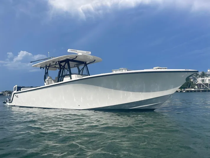  Yacht Photos Pics 2023 SeaVee 37 Z boat on water under clear blue sky.