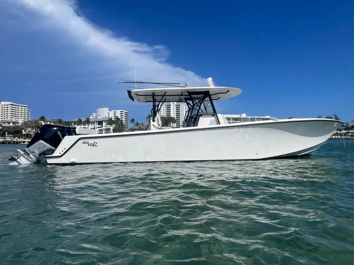  Yacht Photos Pics 2023 SeaVee 37 Z boat on water, clear sky, modern design.