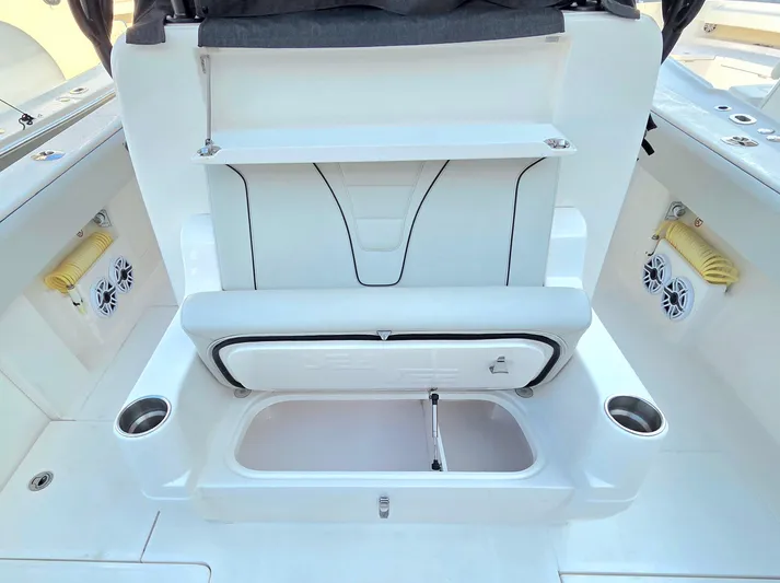  Yacht Photos Pics 2023 SeaVee 37 Z boat interior with storage compartment and cup holders.