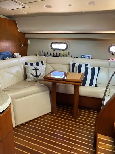  Yacht Photos Pics Luxurious 2009 Tiara Yachts 4300 Sovran interior with elegant seating and nautical decor.