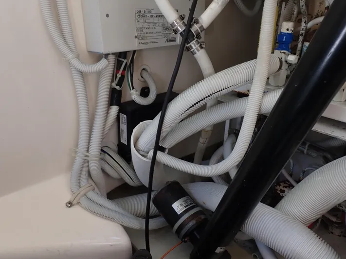  Yacht Photos Pics Engine room of 2009 Tiara Yachts 4300 Sovran with visible wiring and components.