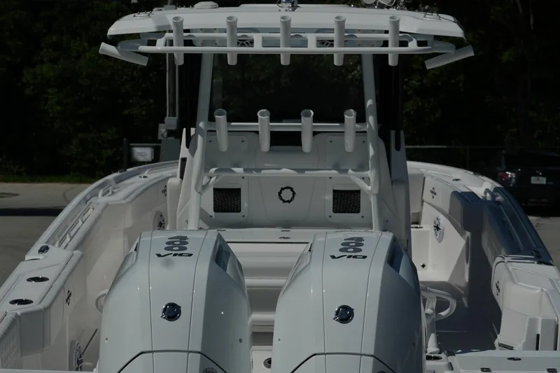  Yacht Photos Pics 2025 Fountain 32 NX boat with dual V10 engines, sleek design, and spacious deck.