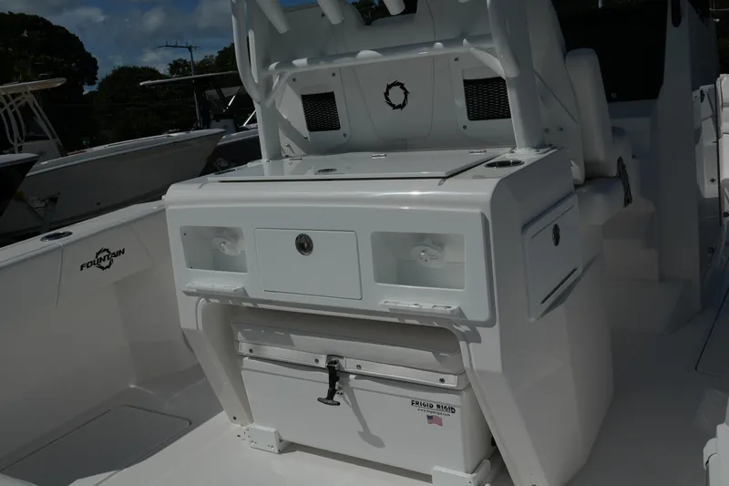  Yacht Photos Pics 2025 Fountain 32 NX boat interior with storage compartments and seating.