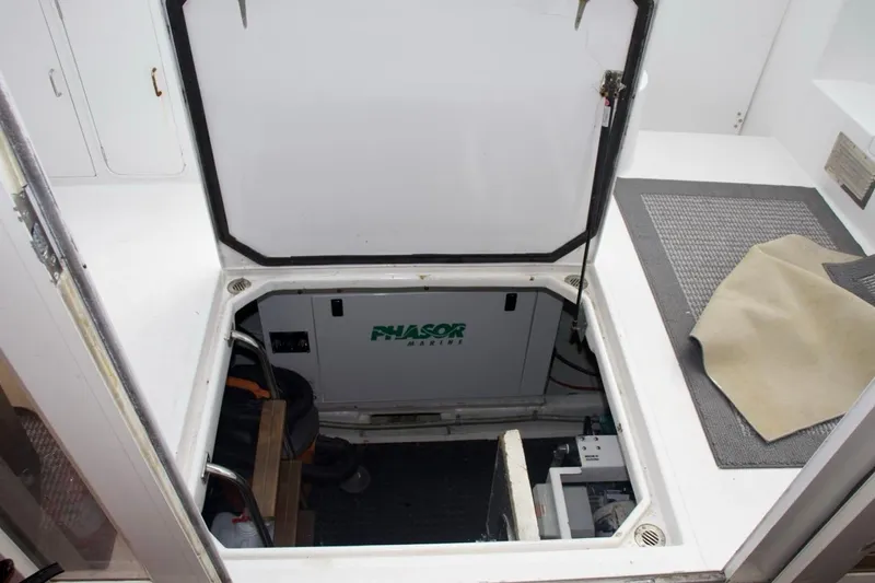  Yacht Photos Pics Engine compartment of 2002 McKinna 57 Pilothouse yacht with Phasor marine generator.