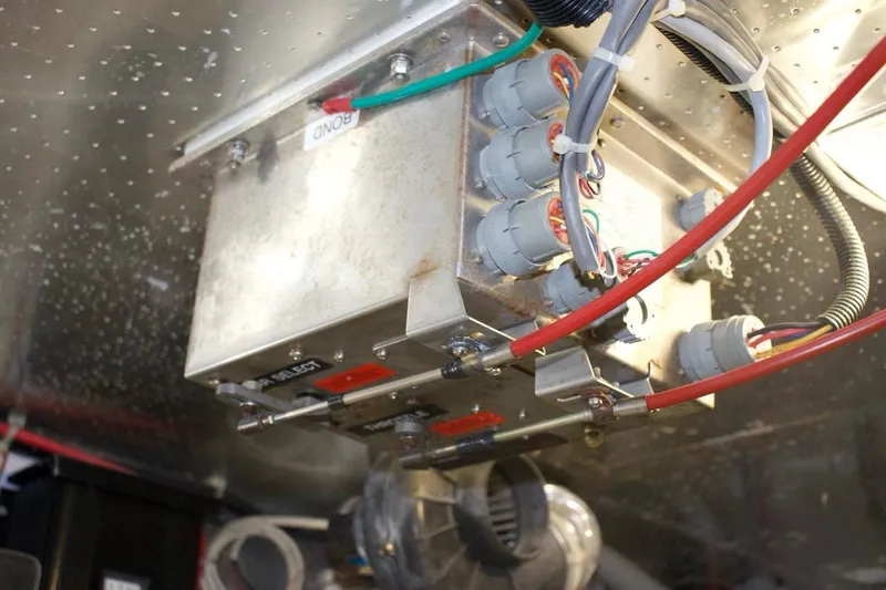  Yacht Photos Pics Electrical components in a 2002 McKinna 57 Pilothouse yacht, featuring wiring and connectors.