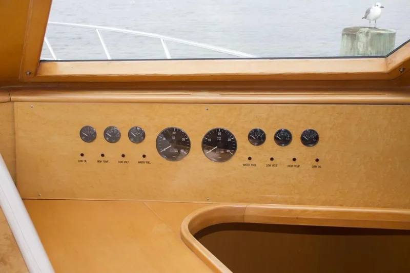  Yacht Photos Pics 2002 McKinna 57 Pilothouse dashboard with gauges and warning indicators.