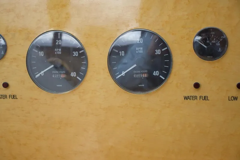  Yacht Photos Pics Close-up of 2002 McKinna 57 Pilothouse dashboard gauges and indicators.