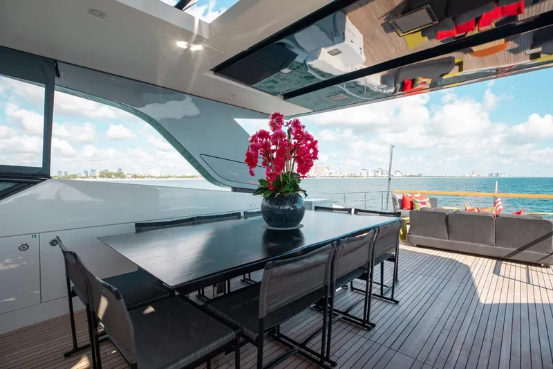 Fifty Shades Yacht Photos Pics Luxurious 2018 Sanlorenzo SL106 yacht deck with dining area and ocean view.
