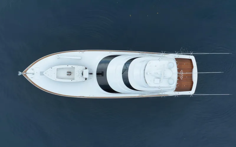 Makara Yacht Photos Pics Overhead view of 2018 Viking 72 Sky Bridge yacht on calm water.