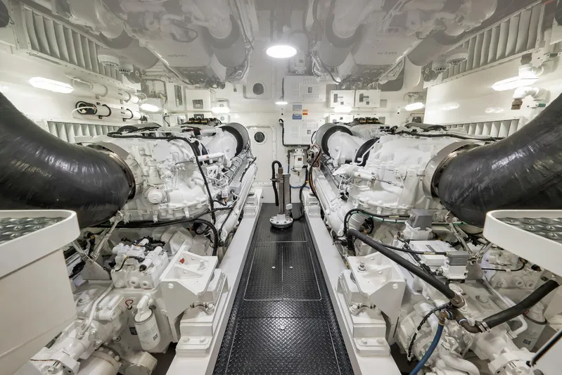 Makara Yacht Photos Pics Engine room of 2018 Viking 72 Sky Bridge yacht, featuring dual engines and advanced machinery.