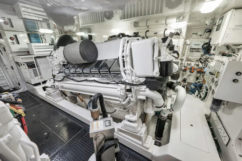 Makara Yacht Photos Pics Engine room of 2018 Viking 72 Sky Bridge yacht, showcasing advanced machinery and equipment.