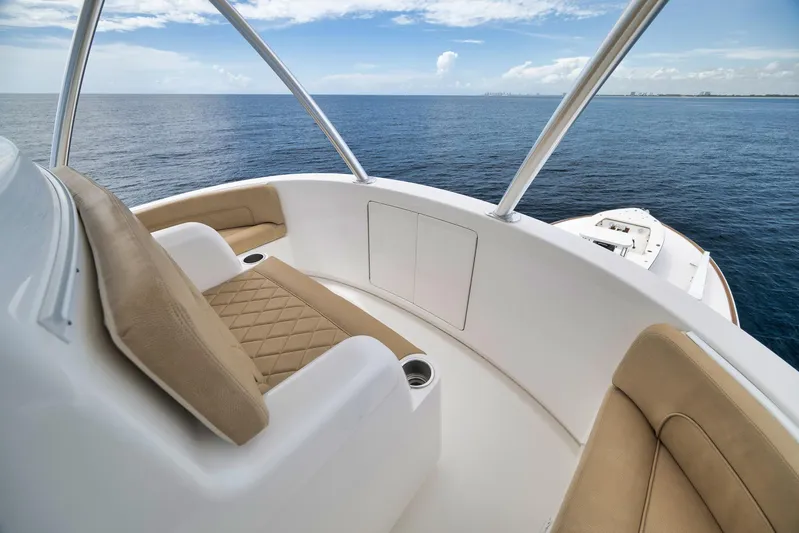 Makara Yacht Photos Pics Luxurious seating on 2018 Viking 72 Sky Bridge yacht overlooking the ocean.