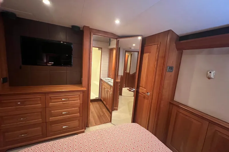 Sixpack Yacht Photos Pics Luxurious interior of 2013 Hatteras GT63 yacht with wood paneling and modern amenities.