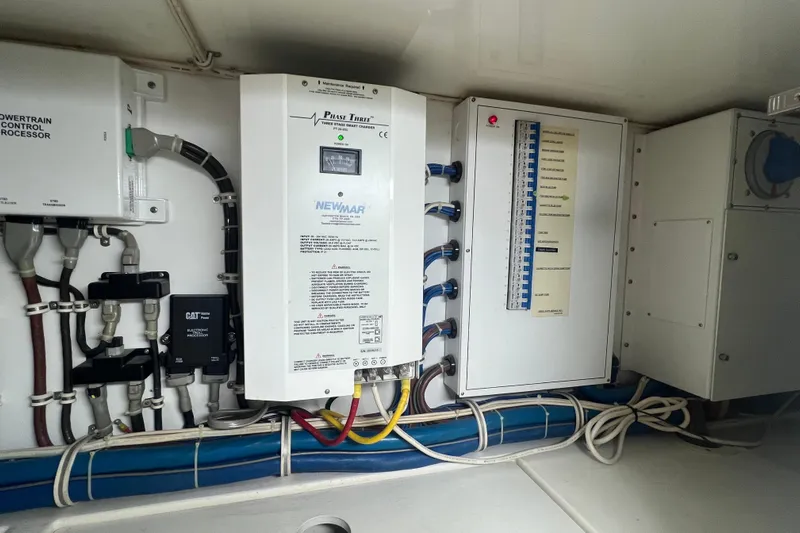 Sixpack Yacht Photos Pics Electrical panel and components inside a 2013 Hatteras GT63 yacht.