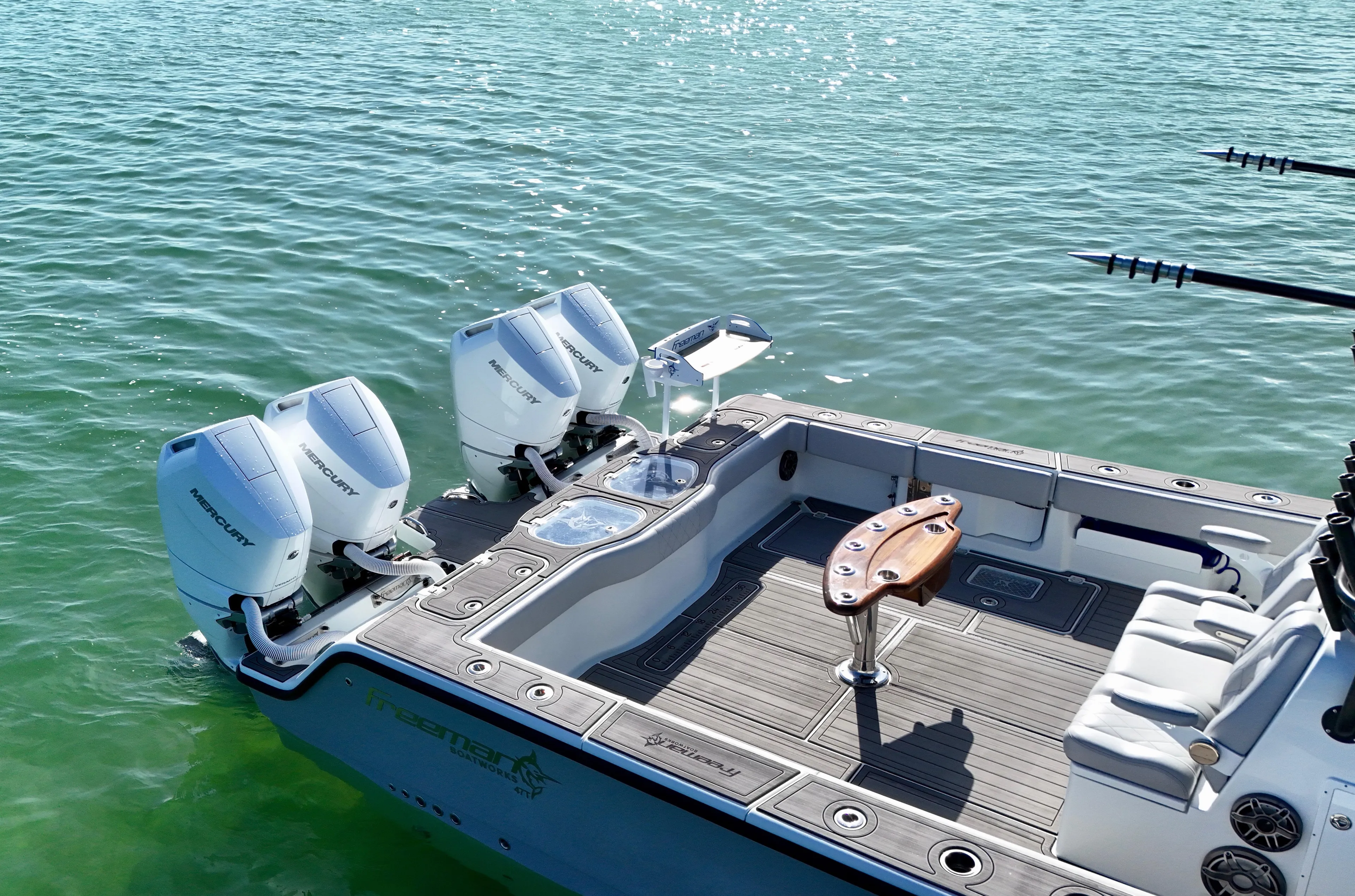  Yacht Photos Pics Freeman 47 boat with dual Mercury engines on clear water, 2021 model.