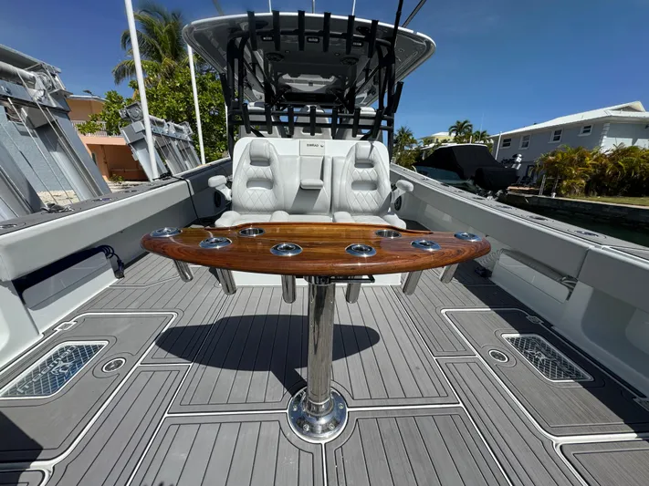  Yacht Photos Pics Luxury Freeman 47 boat interior with seating and wooden table, 2021 model.