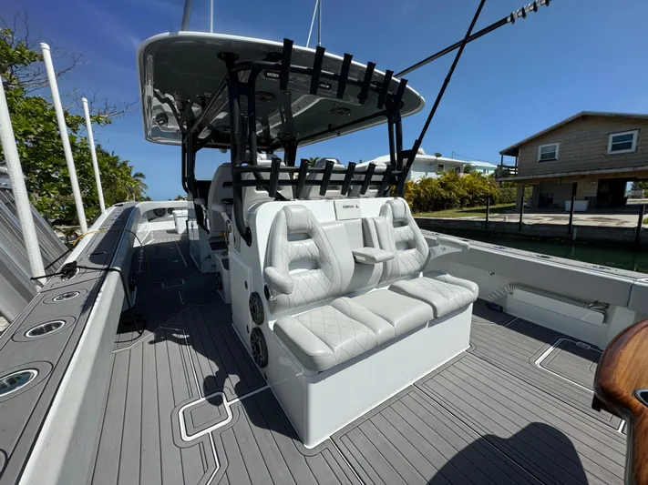  Yacht Photos Pics Luxurious 2021 Freeman 47 boat interior with sleek seating and modern design.