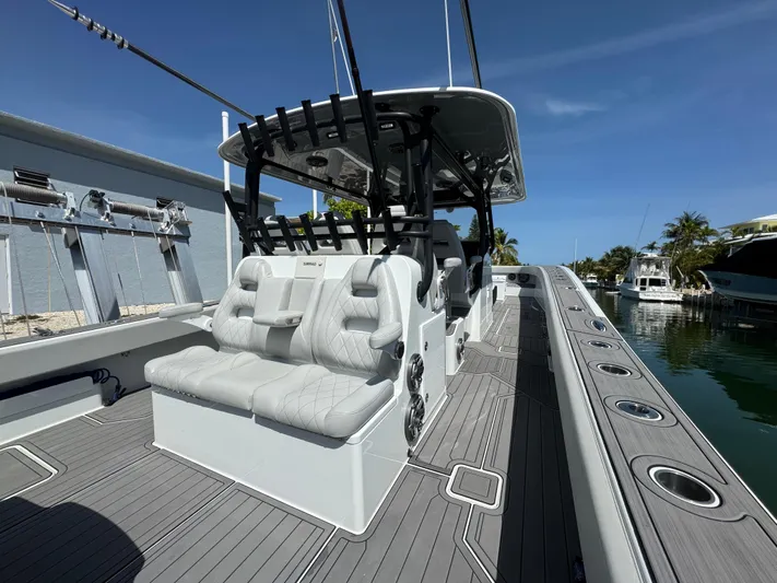  Yacht Photos Pics Freeman 47 boat interior, 2021 model, featuring luxurious seating and sleek design.