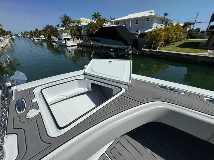  Yacht Photos Pics Open hatch on Freeman 47 boat, docked in a scenic canal, 2021 model.