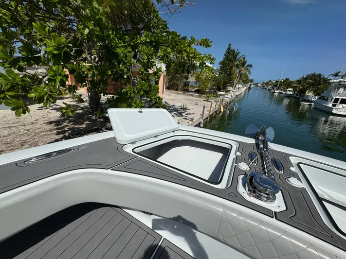  Yacht Photos Pics Open hatch on Freeman 47 boat, docked by a scenic canal, 2021 model.