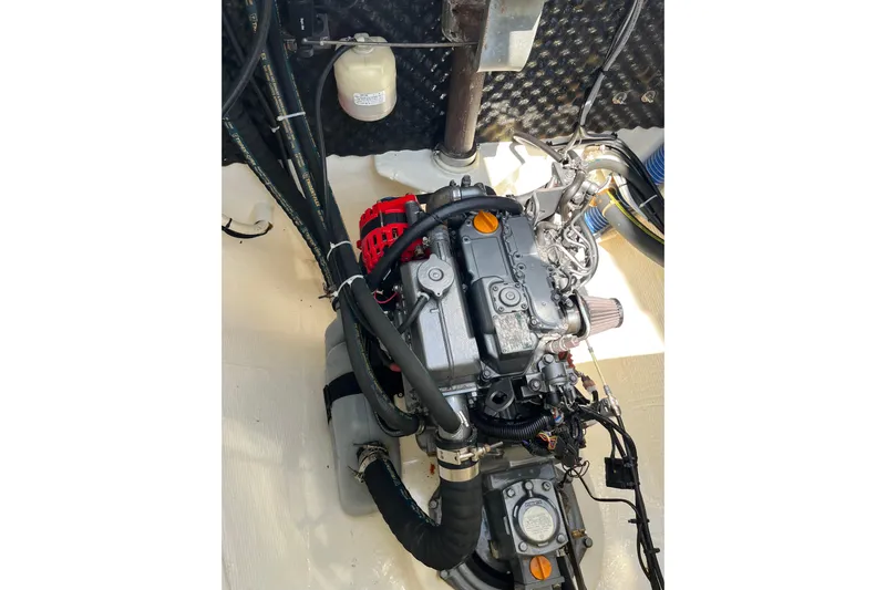 Namaste Yacht Photos Pics Engine compartment of a 2004 Lagoon 380 catamaran, showcasing mechanical components.