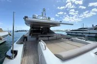 2006 Azimut 86S yacht with spacious deck, docked in a sunny marina.
