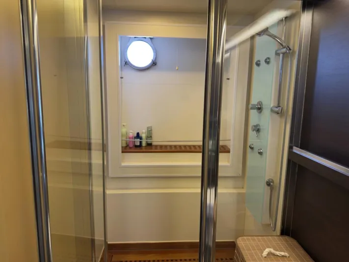  Yacht Photos Pics Luxurious bathroom on 2006 Azimut 86S yacht with modern shower and porthole window.